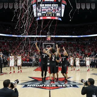 San Diego State basketball players celebrate after a close win